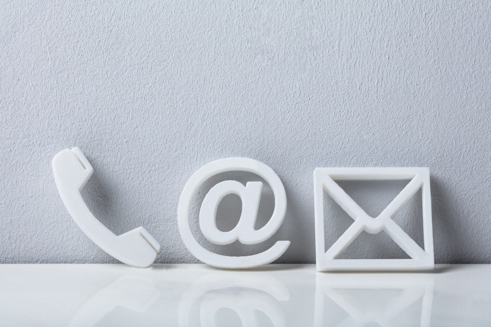 Contact,Methods.,Close-up,Of,A,Phone,,Email,And,Post,Icons